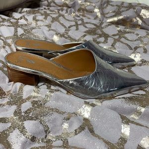 Brand new Franco Sarto silver mules.  Worn one time